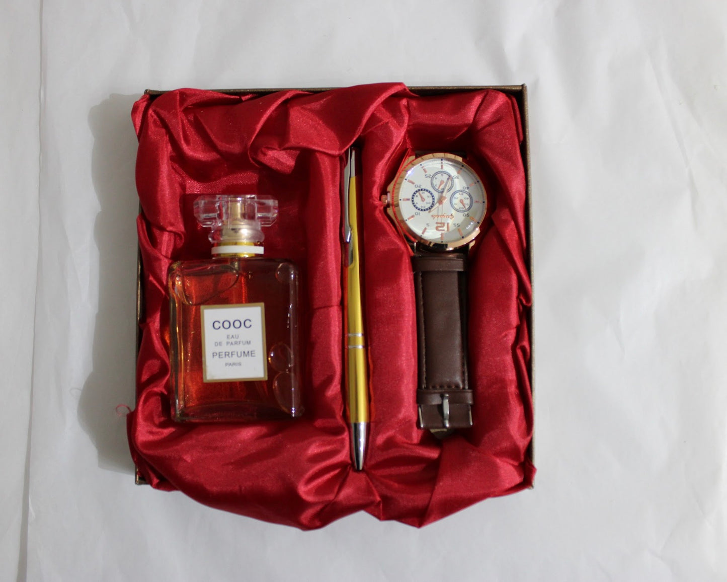 Caja de reloj y loción